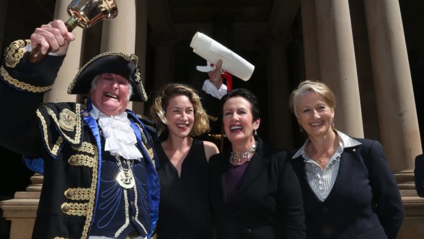 Town crier Graham Keating, Jess Miller, Sydney lord mayor Clover Moore and Professor Kerryn Phelps on the steps of Town Hall at the proclamation of the 2016 council.