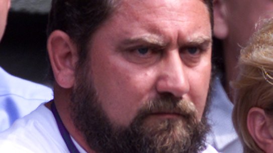 Damir Dokic watches his daughter play at Wimbledon in 2000.