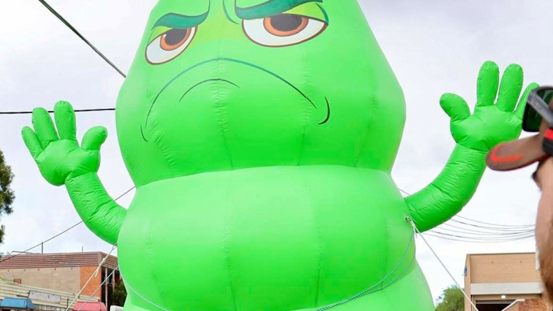 A giant inflatable grub could hold the key to a big workplace dispute