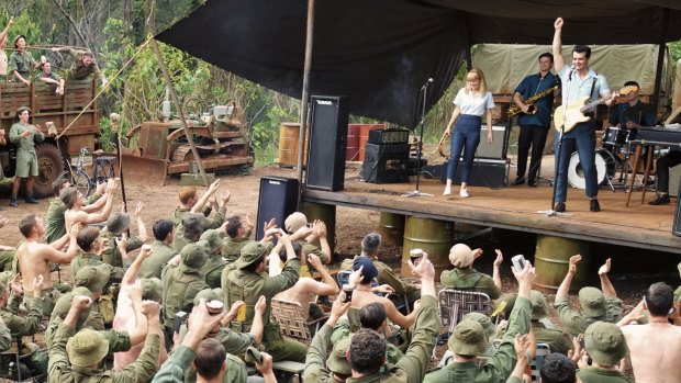 Little Pattie (Emma Dougall) and Col Joye (Geoffrey Winter) perform for the troops at Nui Dat Base in Danger Close: The Battle Of Long Tan.
