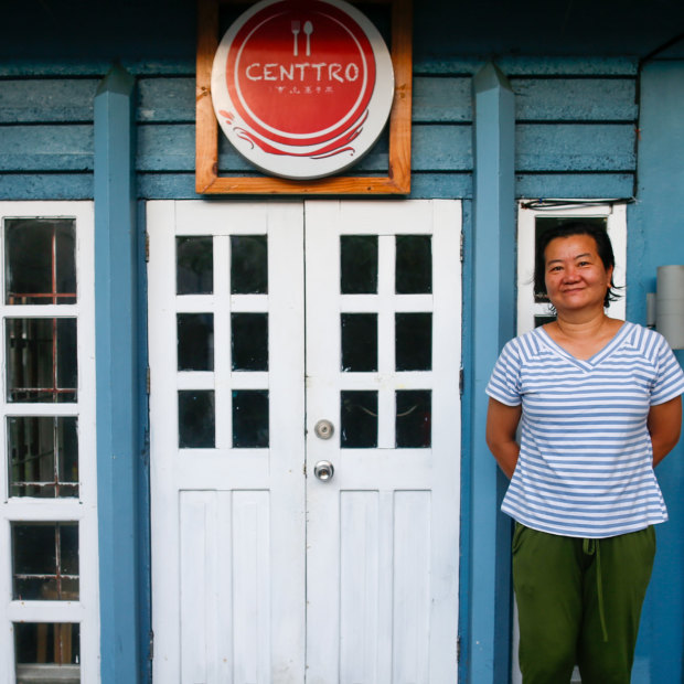 Jeanette “Jinky” Cabardo in front of her cafe in Basco.
