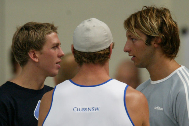 Craig Stevens, Simon Cowley (back turned) and Ian Thorpe share a conversation.