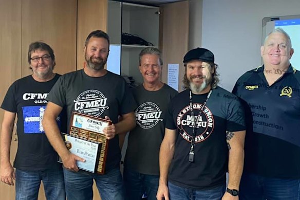 Dean Mattas (second left) receiving the 2020 Delegate of the Year award at a CFMEU event with Michael Ravbar (third from left), Jade Ingham (second right) and Royce Kupsch (far right).