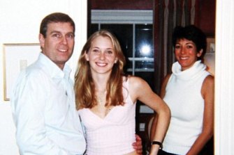 Prince Andrew pictured with Virginia Giuffre, at the home of recently convicted sex-trafficker Ghislaine Maxwell (right) in London in 2001.  