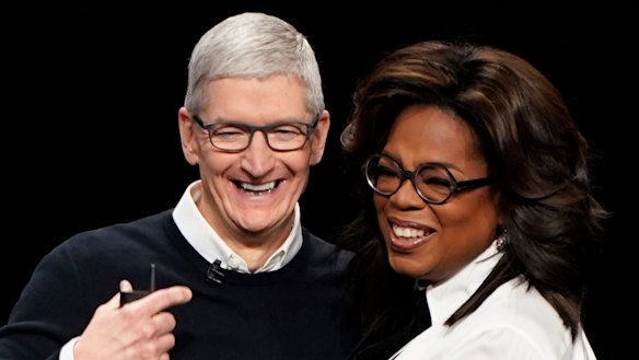 Apple CEO Tim Cook and Oprah Winfrey at the Apple TV+ launch.