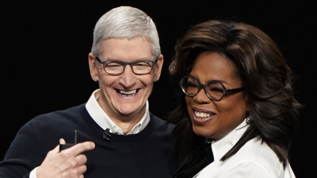 Apple CEO Tim Cook and Oprah Winfrey at the Apple TV+ launch.