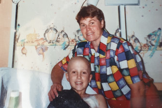Josh Niland, who was diagnosed with cancer at age 8, with his mother, Marea. 