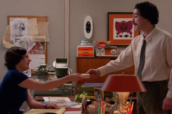 Ben Feldman (right) and Elisabeth Moss in Mad Men