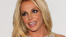 Paparazzi captured Spears, pictured in 2018, standing through a car sunroof.