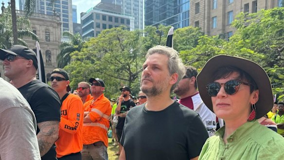 State Greens MPs Amy MacMahon (right) and Michael Berkman at a CFMEU rally in Brisbane.