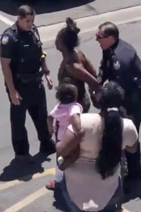 Phoenix police are investigating several officers after mobile phone videos captured them threatening to shoot 22-year-old black man Dravon Ames while screaming and getting rough with his pregnant fiance Iesha Harper and two young children. 