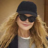 Incoming: Keith Urban and Nicole Kidman arriving into Sydney with their daughters Sunday, 14, and Faith, 11.