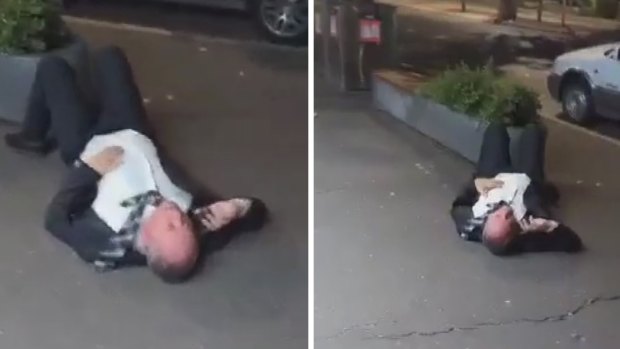 An image from video footage of Barnaby Joyce on the footpath in Braddon, Canberra on Wednesday.