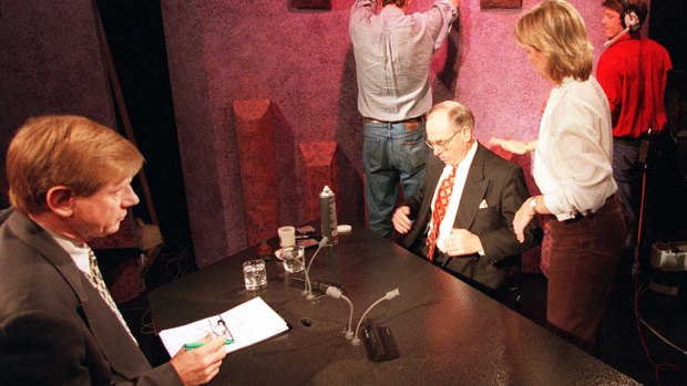 O'Brien (with green pen) and Howard prepare for an interview for <i>The 7.30 Report</i> on the 1996 budget.