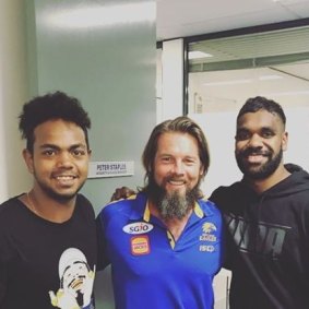 Ben Cousins with West Coast Eagle player Willie Rioli. 