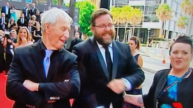 In happier times: Deb Fryers on the red carpet with Paul Hogan and Shane Jacobson in December 2016.