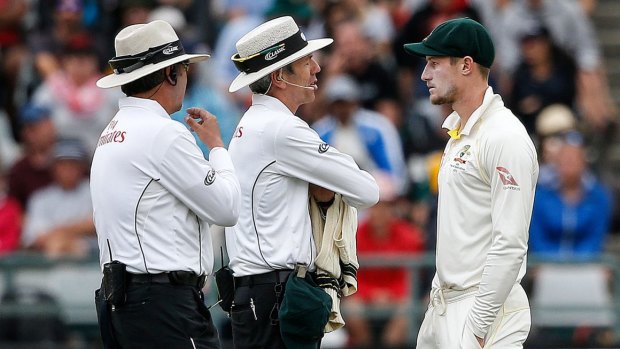 Cameron Bancroft is questioned by umpires after the ball tampering incident.
