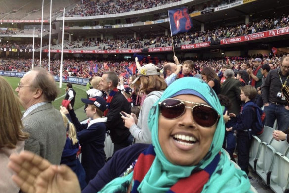 Demons fan and footy tragic Rana Hussain enjoying a game at the ’G.