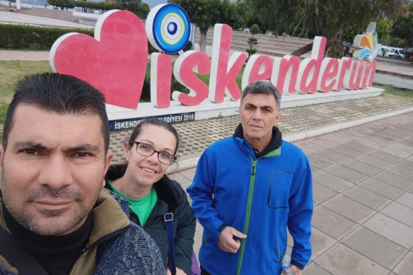 Suat Bayram (right) with nephew Ulas Hussam and wife Bahar, who are all missing in Kirikhan, Hatay, after the earthquake.