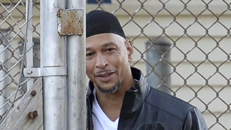 Former Carolina Panthers NFL football player Rae Carruth exits the Sampson Correctional Institution on Monday.