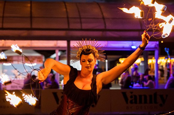 A fire twirler at Brisbane’s West End Solstice Market.