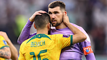 Aziz Behich and Mat Ryan after Australia's loss to Argentina. 