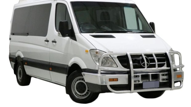 The van is believed to be a Mercedes Sprinter or similar.