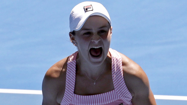 Ashleigh Barty celebrates after defeating Russia's Maria Sharapova 