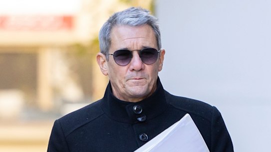 ACT Director of Public Prosecutions Shane Drumgold arrives at the ACT Civil and Administrative Tribunal in Canberra on Monday.