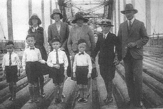 April 1931 before the road surfacing. Ian Litchfield (left), Eric (third from left) with their mother Madge behind and father Frank right.