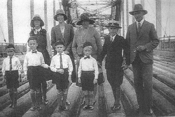 April 1931 before the road surfacing. Ian Litchfield (left), Eric (third from left) with their mother Madge behind and father Frank right.