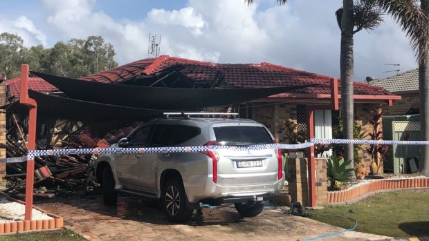 A crime scene has been set up at a Coombabah home after a blaze.