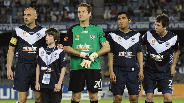 Hamish beside Kevin Muscat, before the start of the match against Qatar in Melbourne a decade ago.