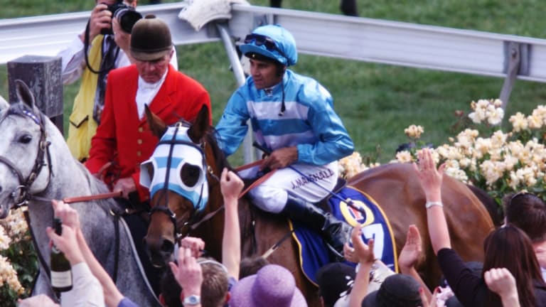 John Marshall on Rogan Josh, after winning the 1999 Melbourne Cup.