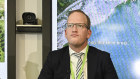 Strike Energy chief executive Stuart Nicolls and his Beach Energy counterpart  Morne Engelbrecht on stage together at a conference in June.