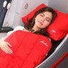 Airline review: This cheap (nearly) lie-flat bed is perk-free but worth it