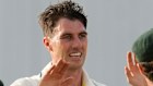 Australia’s captain Pat Cummins celebrates taking the wicket of West Indies’ Keacy Carty.