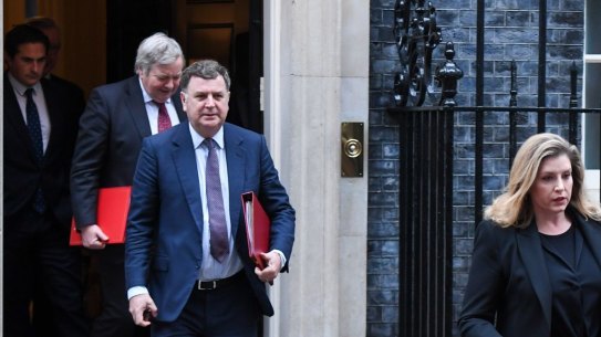 Mel Stride, UK work and pensions secretary (second from right) departs following a cabinet meeting at 10 Downing Street.
