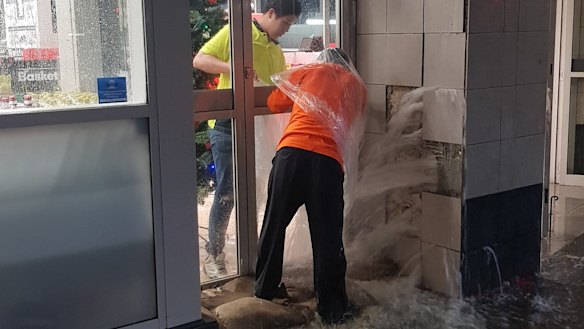 Rain pouring out of the walls at Woolworths Town Hall.