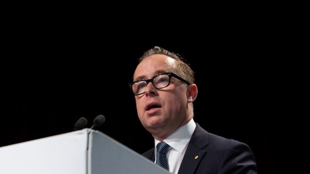 Alan Joyce is confident that Qantas will have a strong second half after it was hit by a $416 million spike in fuel costs in the six months to December.