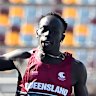 Gout Gout waves during his run in the 100 metres in the Australian Athletics junior championships.