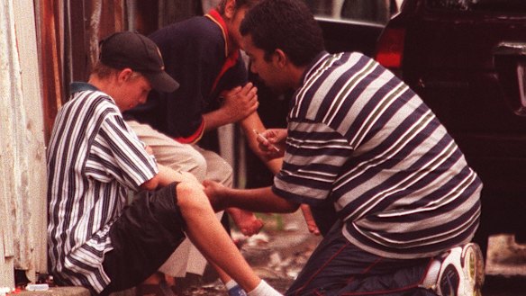 Heroin users on the footpath in Redfern in 1999.