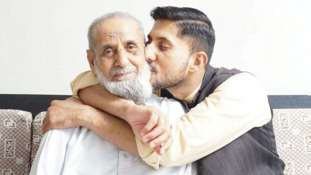 Zeeshan Akbar with his father, Mohammad (left).