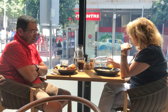 Surveillance photo of Sam Aziz meeting former Liberal Party MP Lorraine Wreford in a city cafe.