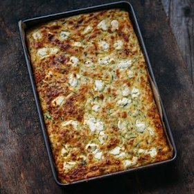 Zucchini slice with feta and chopped dill.