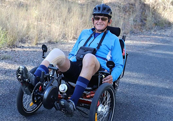 Clive Bassett is in his 80s and enjoys riding his electric trike for exercise and fun. He does not hold a driver’s licence, so would be banned from riding this bike, which only receives some assistance, while pedalling, up to 25km/h. He could, however, use an electric wheelchair.