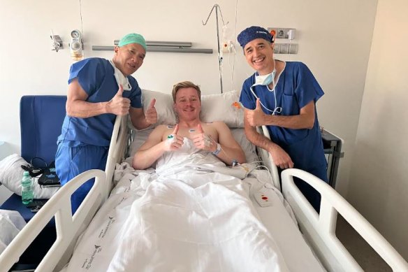 Billy Baldwin with Charlie Teo (left) after having a tumour removed from his lower back in the Hospital Universitario Fundacion Jimenez Diaz in Madrid, Spain.