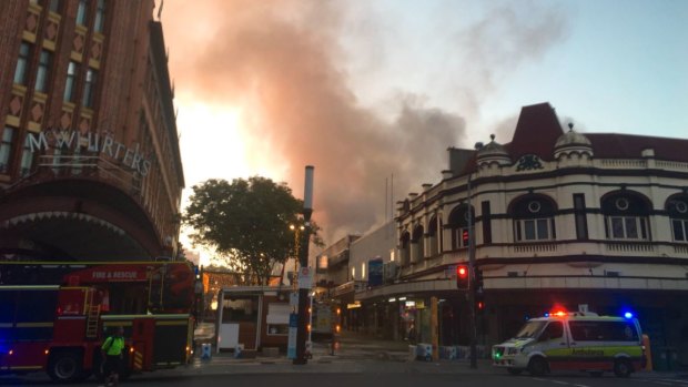 Firefighters respond to the blaze in Brunswick Street Mall, Fortitude Valley.