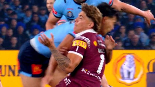 Screengrab of State of Origin 2 promotion showing Reece Walsh being taken out by Joseph Suaalii in game 1 in Sydney.