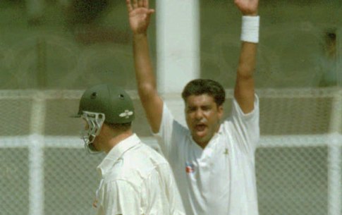 Waqar Younus celebrates as Mark Taylor makes a pair. Friday, Sept. 30, 1994 at the National Stadium in Karachi.